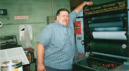 Hank at the printing press